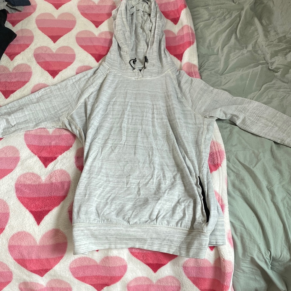 Brand is American Eagle, Color is a light grey and the size is Medium